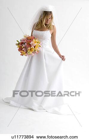 Picture - Bride holding bouquet. Fotosearch