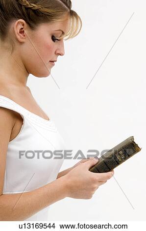 Picture - Bride holding Holy Bible. Fotosearch