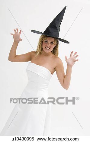 Bride wearing a witch's hat View Large Photo Image Stock Photography - Bride wearing a witch's hat. Fotosearch