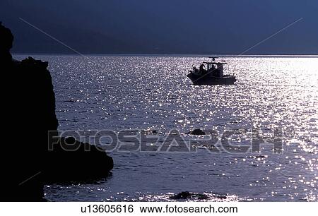 Fishing boat in the water View Large Photo Image Stock Photograph - Fishing boat in the water. Fotosearch