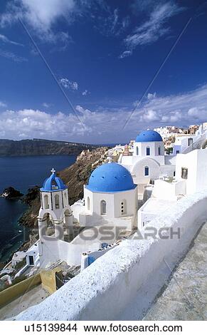 Picture - Greek island churches on cliff. Fotosearch