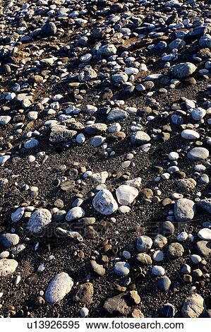 Stock Photography - Rocks on a beach. Fotosearch