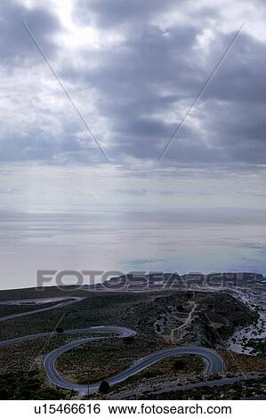 Winding road with sea view View Large Photo Image Stock Photograph - Winding road with sea view. Fotosearch