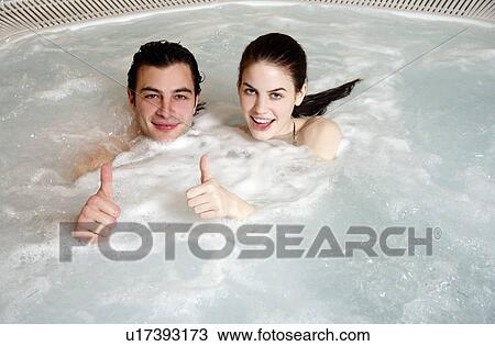 One man with one woman in jacuzzi at a spa View Large Photo Image Stock Image - One man with one woman in jacuzzi at a spa. Fotosearch