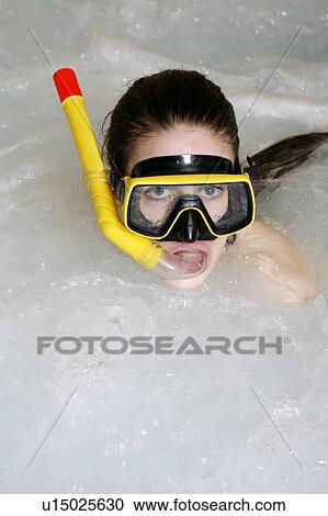 One woman wearing mask and snorkel in jacuzzi at a spa View Large Photo Image Stock Image - One woman wearing mask and snorkel in jacuzzi at a spa. Fotosearch