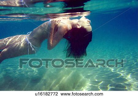 Woman under the water View Large Photo Image Stock Image - Woman under the water. Fotosearch