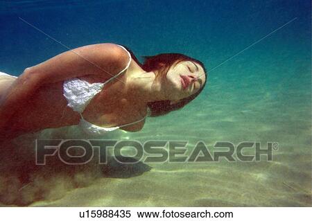 Woman under the water View Large Photo Image Stock Photography - Woman under the water. Fotosearch