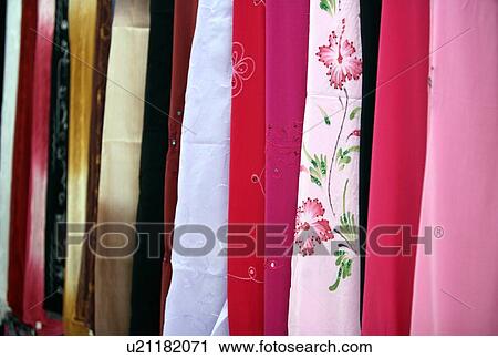 Stock Image - Row of scarves. Fotosearch