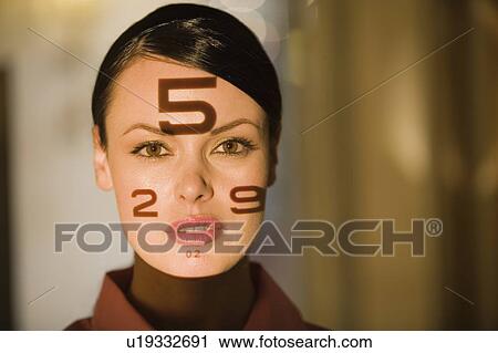 Woman with optical exam numbers on her face View Large Photo Image Stock Image - Woman with optical exam numbers on her face. Fotosearch