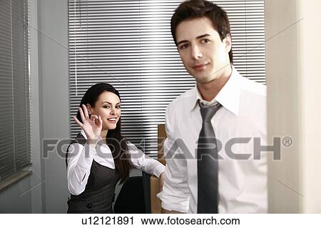 Stock Image - Business people in office. Fotosearch