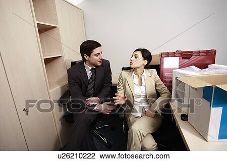 Business people in office with boxes View Large Photo Image Stock Image - Business people in office with boxes. Fotosearch