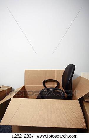 New chair in box View Large Photo Image Stock Photo - New chair in box. Fotosearch