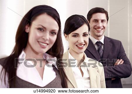 Stock Image - Three business people. Fotosearch