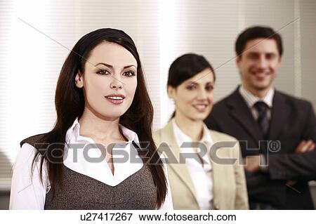 Stock Photo - Three business people. Fotosearch