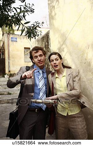 Picture - Business couple with a map. Fotosearch