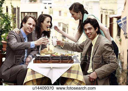 Business couples at taverna View Large Photo Image Stock Image - Business couples at taverna. Fotosearch