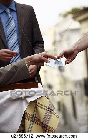 Businessmen at taverna paying bill View Large Photo Image Stock Image - Businessmen at taverna paying bill. Fotosearch