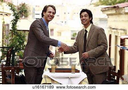 Businessmen shaking hands View Large Photo Image Stock Photo - Businessmen shaking hands. Fotosearch