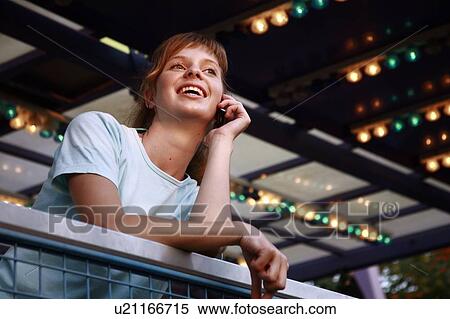 Female teenager on cell phone View Large Photo Image Stock Photography - Female teenager on cell phone. Fotosearch