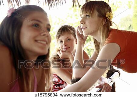 Picture - Female teenagers hanging out. Fotosearch