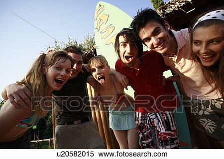 Teenagers posing in amusement park View Large Photo Image Stock Photography - Teenagers posing in amusement park. Fotosearch