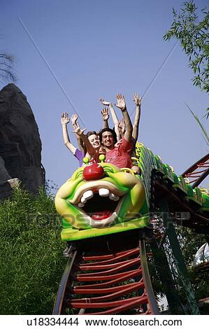 Teenagers on amusement park ride View Large Photo Image Picture - Teenagers on amusement park ride. Fotosearch