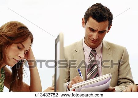 Stock Image - Closeup of business people. Fotosearch