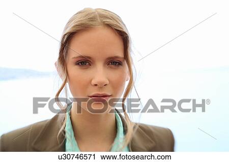 Closeup of woman looking at camera View Large Photo Image Stock Image - Closeup of woman looking at camera. Fotosearch