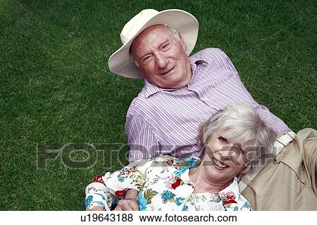 Stock Photo - Senior couple in the park. Fotosearch