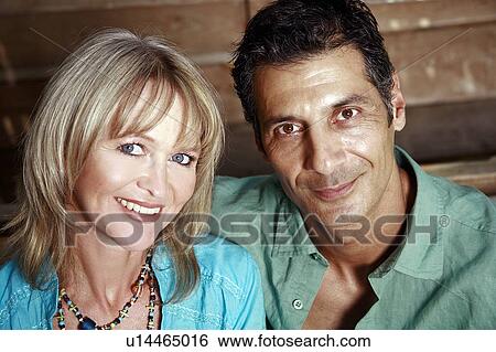 Stock Photograph - Mature adult couple closeup. Fotosearch