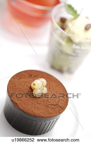 Stock Image - Chocolate cupped cake on plate. Fotosearch