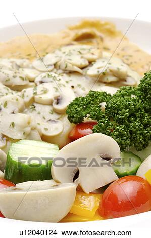 Picture - Salad with dressing on plate, close-up. Fotosearch