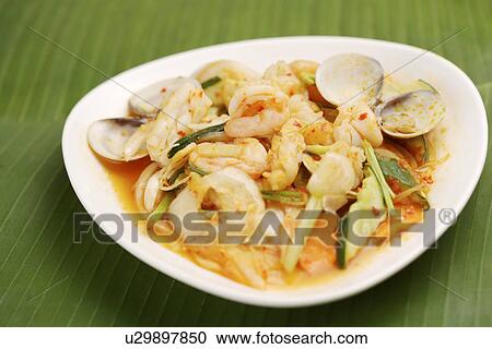 Fried Seafood In Spicy Sauce View Large Photo Image Stock Image - Fried Seafood In Spicy Sauce. Fotosearch