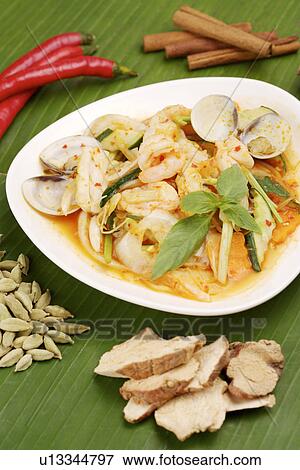 Fried Seafood In Spicy Sauce View Large Photo Image Stock Photo - Fried Seafood In Spicy Sauce. Fotosearch