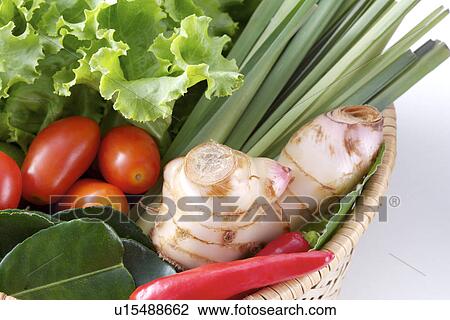 Stock Image - Ingredients in bamboo basket. Fotosearch