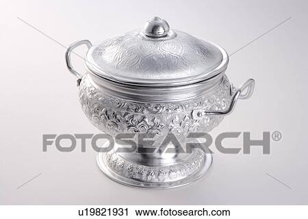 Stock Image - Pot with cooked rice. Fotosearch