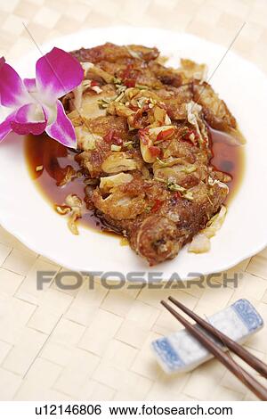 Stock Photograph - Spiced Chicken With Chili Sauce . Fotosearch