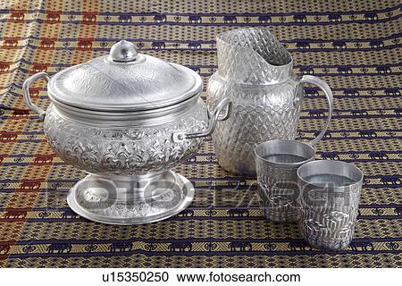 Stock Image - Teacup, teapot and pot. Fotosearch