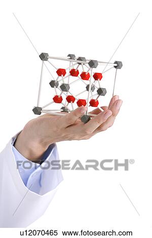 Focus on hand holding molecular structure View Large Photo Image Stock Photography - Focus on hand holding molecular structure. Fotosearch