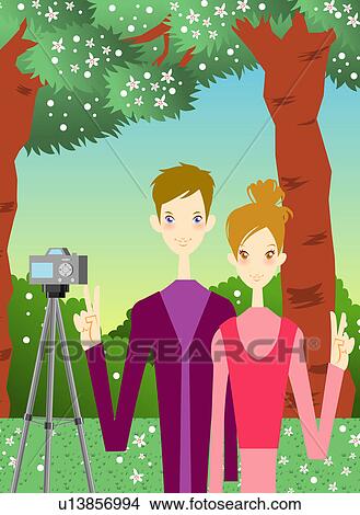Stock Illustration - Young couple posing and taking picture in forest. Fotosearch