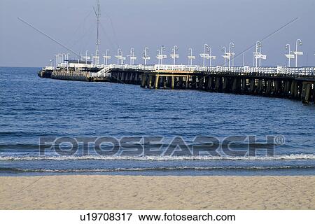 Stock Photo - Dock at beach. Fotosearch