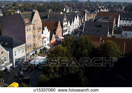 Stock Image - Elevated view with houses and trees. Fotosearch
