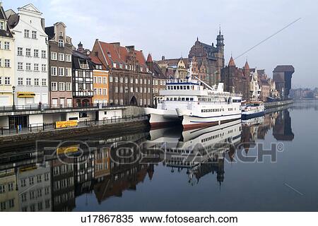 Stock Photography - Houses by river with a ship. Fotosearch
