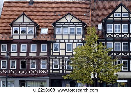 Stock Photo - Houses with tree. Fotosearch