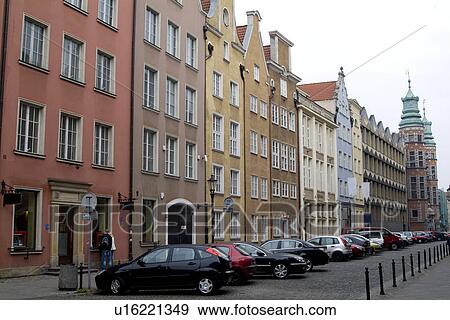 Row of houses with cars parking aside View Large Photo Image Stock Photo - Row of houses with cars parking aside. Fotosearch