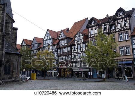 Stock Photograph - Rows of houses with trees. Fotosearch