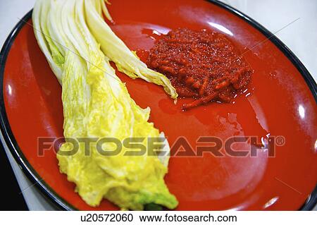 Bok choy and seasoning on plate View Large Photo Image Stock Image - Bok choy and seasoning on plate . Fotosearch