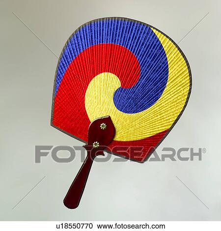 Stock Image - Fan against white background, close up. Fotosearch