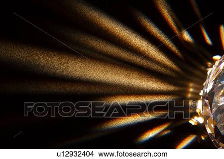 Picture - A huge diamond glistens with light . Fotosearch