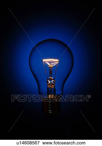 Stock Photo - A lit light bulb. Fotosearch